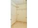 Spacious walk-in closet with white wire shelving for organized storage at 2144 Rookery Ln, Sanford, FL 32773