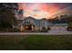 Gorgeous home with an expansive front lawn, showcasing its stunning architecture and well-maintained landscaping at 2240 W Dale Cir, Deland, FL 32720