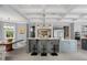 Bright kitchen with a large center island, modern appliances, and coffered ceiling, perfect for entertaining at 2240 W Dale Cir, Deland, FL 32720