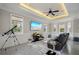 Relaxing living room with a large flat-screen TV and backyard views at 2240 W Dale Cir, Deland, FL 32720