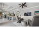 Open concept living area with a modern kitchen, a beautiful aquarium, and comfortable seating area at 2240 W Dale Cir, Deland, FL 32720
