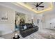 Relaxing living room featuring a comfortable leather sofa, and stylish decor with access to exercise room at 2240 W Dale Cir, Deland, FL 32720