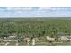 Aerial view of suburban houses with lush green landscapes at 2662 Haulover Blvd, Deltona, FL 32738