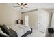 Bedroom featuring tiled floor, a ceiling fan, and a private bathroom at 2662 Haulover Blvd, Deltona, FL 32738