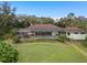 Expansive backyard with a screened-in pool area, perfect for outdoor entertainment and relaxation at 2931 Sunbittern Ct, Windermere, FL 34786