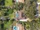Aerial view of home with screened-in pool and tile roof at 2931 Sunbittern Ct, Windermere, FL 34786