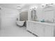 Bright bathroom features double sinks and a standalone tub at 2931 Sunbittern Ct, Windermere, FL 34786