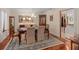 A beautiful dining room with a large area rug and cabinetry with natural light streaming through the windows at 2931 Sunbittern Ct, Windermere, FL 34786