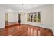 Charming dining room showcases hardwood floors, chandelier, and abundant natural light at 2931 Sunbittern Ct, Windermere, FL 34786