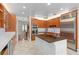 Spacious kitchen with custom island, stainless appliances, and granite counters at 2931 Sunbittern Ct, Windermere, FL 34786