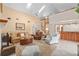 Bright living room featuring a spiral staircase, and bar with seating at 2931 Sunbittern Ct, Windermere, FL 34786