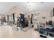 Large office features a chandelier and natural light at 2931 Sunbittern Ct, Windermere, FL 34786