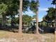 Community playground area featuring modern play structures and secure fencing, promoting fun and safety at 2931 Sunbittern Ct, Windermere, FL 34786