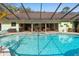 Relax in this home's inviting screened-in pool and patio area at 2931 Sunbittern Ct, Windermere, FL 34786