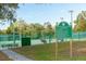 Windermere Recreation Center tennis courts with rules displayed on a sign at 2931 Sunbittern Ct, Windermere, FL 34786