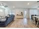 Bright living area with contemporary furniture and ample natural light from the windows at 2970 Scout St, St Cloud, FL 34771