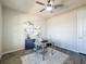 Modern office space with sleek glass desk, neutral decor, and stylish gray accents at 2970 Scout St, St Cloud, FL 34771