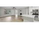 Bright living room features a fireplace, and a large window for natural light at 320 Black Oak Ct # 102, Altamonte Springs, FL 32701