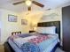 Inviting bedroom featuring a comfortable queen-size bed and ceiling fan at 322 And 322 1/2 S Maple Ave, Sanford, FL 32771