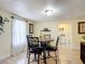 Cozy dining area with a view of the kitchen, perfect for casual Gathering meals at 322 And 322 1/2 S Maple Ave, Sanford, FL 32771