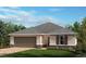 Charming single-story home with attached two car garage, brick driveway, manicured lawn and tasteful landscaping at 3409 Sanctuary Dr, Clermont, FL 34714