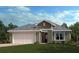 Charming single-story home with a two-car garage, manicured lawn, and classic architectural details at 3465 Sanctuary Dr, Clermont, FL 34714