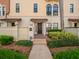 Inviting home exterior showcasing a secure entrance, tiled roof detail, and lush landscaping at 4504 Messina Dr, Lake Mary, FL 32746