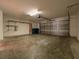 Spacious two-car garage with an automatic door, ample storage space, and concrete floor at 4504 Messina Dr, Lake Mary, FL 32746