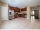 Spacious kitchen features stainless steel appliances, granite countertops, and tile flooring at 4504 Messina Dr, Lake Mary, FL 32746