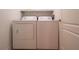 Laundry room with white washer and dryer at 4504 Messina Dr, Lake Mary, FL 32746
