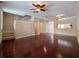Open living room boasting hardwood floors and staircase to the next level at 4504 Messina Dr, Lake Mary, FL 32746