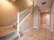 Elegant stairway with carpeted steps and white railing connecting multiple levels of the home at 4504 Messina Dr, Lake Mary, FL 32746