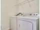 This laundry room features a washer and dryer at 5029 Southlawn Ave, Orlando, FL 32811