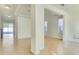 Bright and airy living room features tile floors, neutral walls, and ample natural light at 5029 Southlawn Ave, Orlando, FL 32811