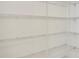 Well-organized pantry with metal shelving providing ample storage for groceries and household items at 5029 Southlawn Ave, Orlando, FL 32811