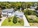Aerial view of property with manicured lawn and landscaping at 515 Clayton St, Orlando, FL 32804