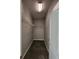 Walk-in closet with carpet flooring, wire shelving, and a door at 5342 Rabbit Ridge Trl, Orlando, FL 32818