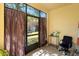 Enclosed patio with curtains offering a view of the backyard and landscaping at 5373 Via Appia Way, Sanford, FL 32771