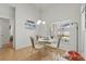 Charming breakfast nook with table and chairs and backyard view at 548 Burford Cir, Davenport, FL 33896