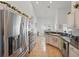 Spacious kitchen with stainless steel appliances and eat-in breakfast area at 548 Burford Cir, Davenport, FL 33896