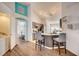Stylish kitchen features seating, stainless appliances, and sleek countertops at 611 Saddle Ridge Dr, Davenport, FL 33896
