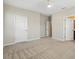 Spacious bedroom featuring neutral walls, carpet flooring, and a ceiling fan at 7776 Rigby St, Windermere, FL 34786