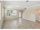 Bright and spacious living area with tile flooring at 7776 Rigby St, Windermere, FL 34786