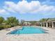Community pool offers a refreshing escape with ample lounging space and neighborhood views at 7776 Rigby St, Windermere, FL 34786