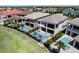 Beautiful home featuring private pools, outdoor living spaces, and views at 942 Jack Nicklaus Ct, Kissimmee, FL 34747