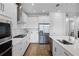 Well-equipped kitchen featuring stainless steel appliances and a large island with a sink at 1118 Eagles Pass Way, Winter Garden, FL 34787