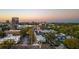 Aerial view showcases the property's location within a vibrant city and lush surroundings at 115 E Concord St # 3, Orlando, FL 32801