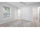 Well-lit bedroom with a window and a closet offers a comfortable and functional space at 115 E Concord St # 3, Orlando, FL 32801