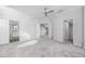 Bright bedroom features neutral tones, walk-in closet, and easy access to a full bathroom at 115 E Concord St # 3, Orlando, FL 32801