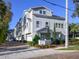 Attractive two-story townhome with a well-kept front yard and classic architectural details at 115 E Concord St # 3, Orlando, FL 32801